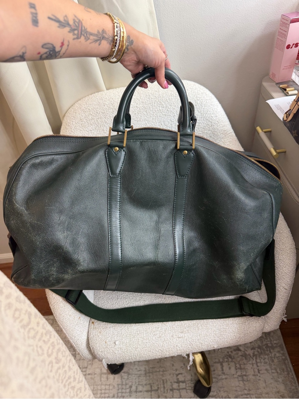 Louis Vuitton green leather travel duffel with Gold-toned hardware. Unisex